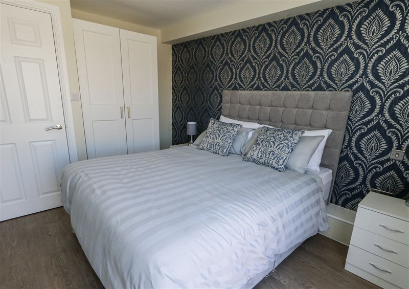 This is a bedroom at Apartment 1, Weymouth