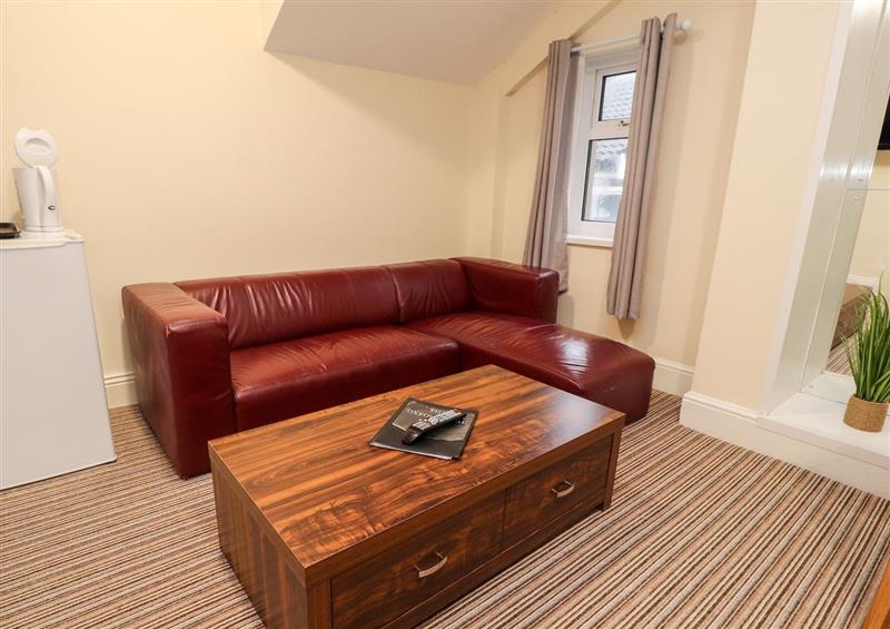 Relax in the living area at Apartment 12, Blackpool