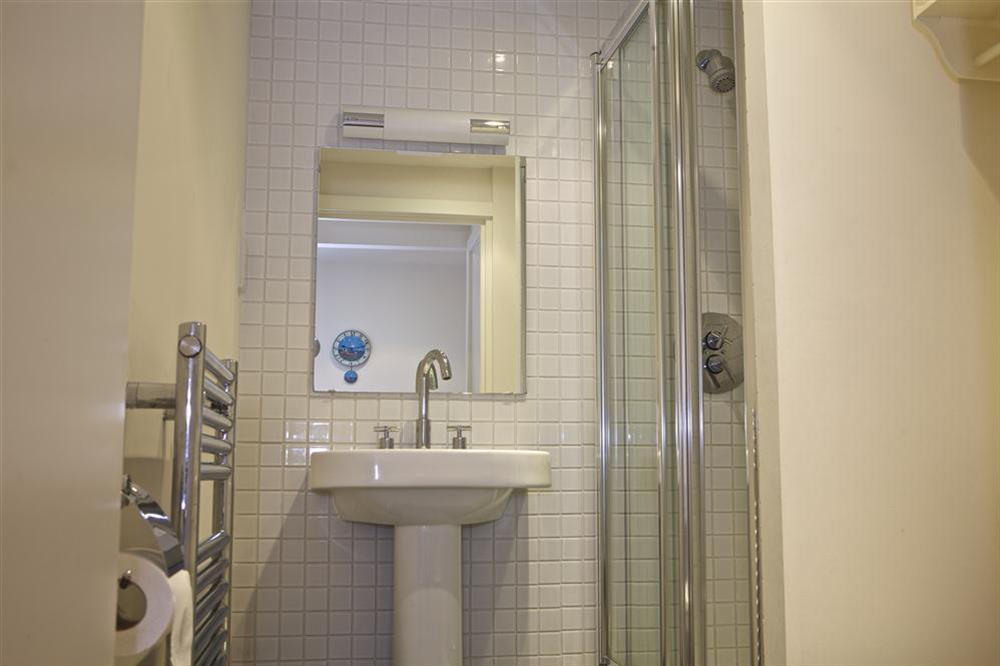 En suite bathroom with shower at Apartment 13 Combehaven in Allenheyes Road, Salcombe