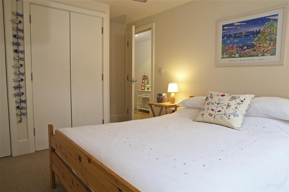Master bedroom with fitted wardrobes at Apartment 13 Combehaven in Allenheyes Road, Salcombe