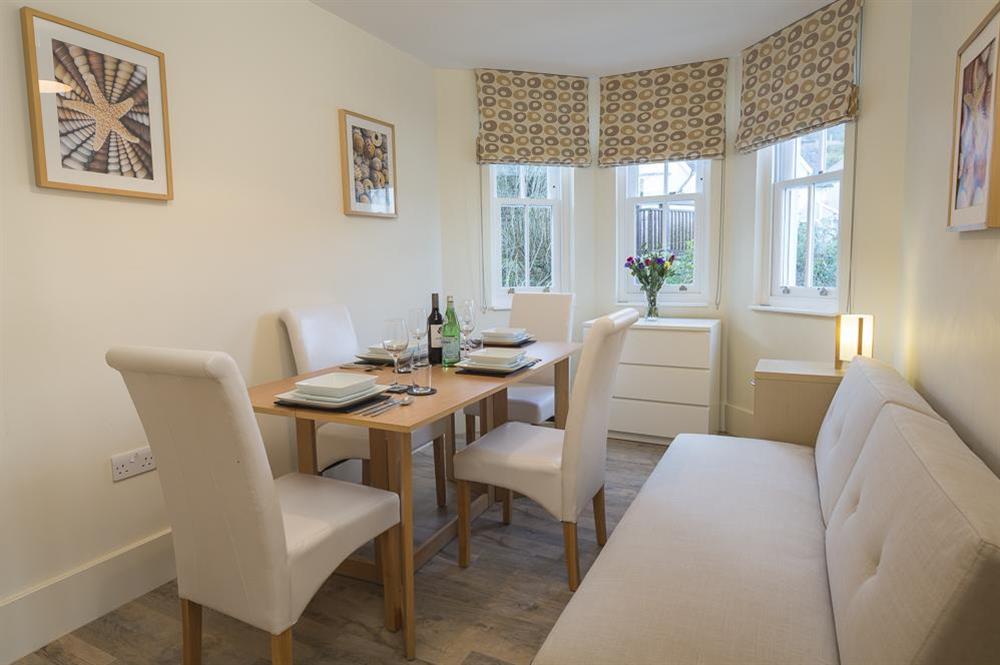 Dining area, comfortably seating up to six guests at Apartment 14, Combehaven in Allenhayes Road, Salcombe