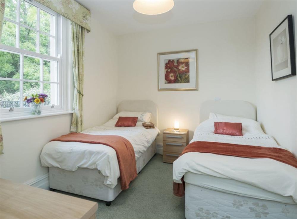 Comfortable twin bedroom with en-suite with shower cubicle at Apartment 14, Hazelwood Hall in Silverdale, near Carnforth, Lancashire