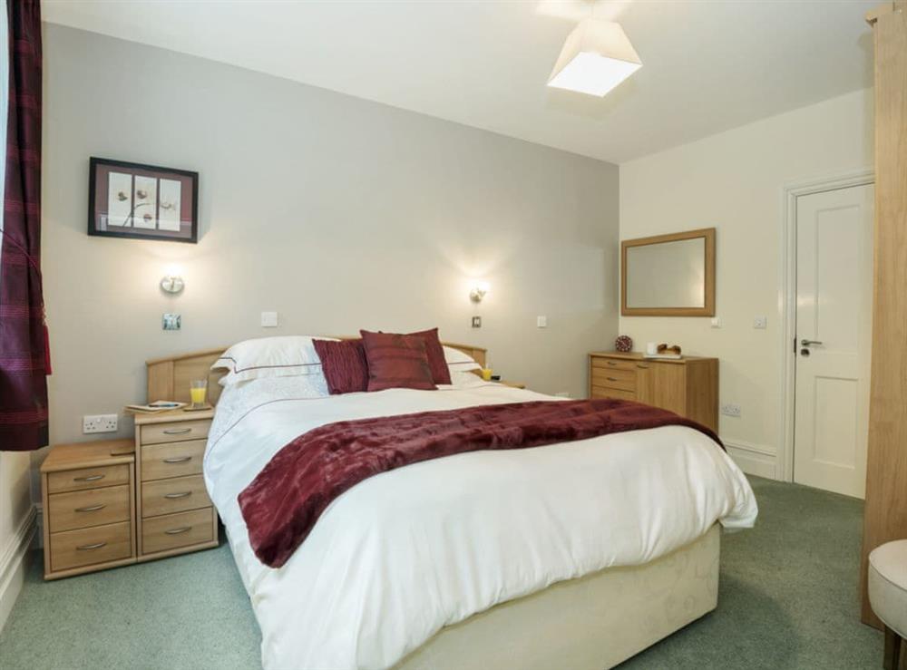 Elegantly decorated double bedroom with en-suite bathroom at Apartment 14, Hazelwood Hall in Silverdale, near Carnforth, Lancashire