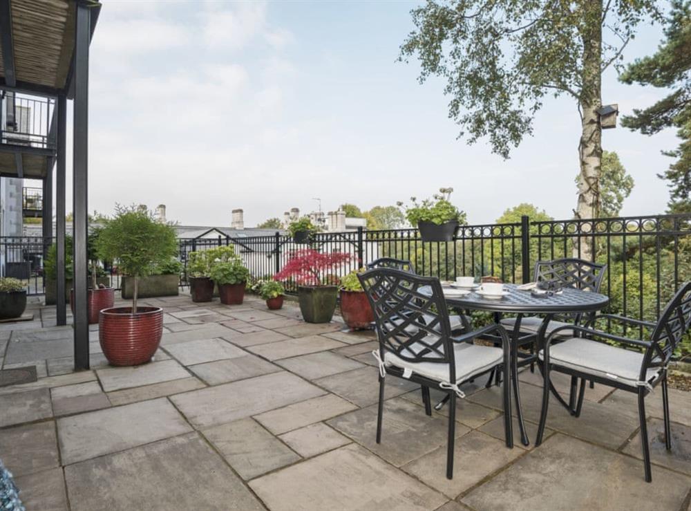 Relaxing patio with garden furniture at Apartment 14, Hazelwood Hall in Silverdale, near Carnforth, Lancashire