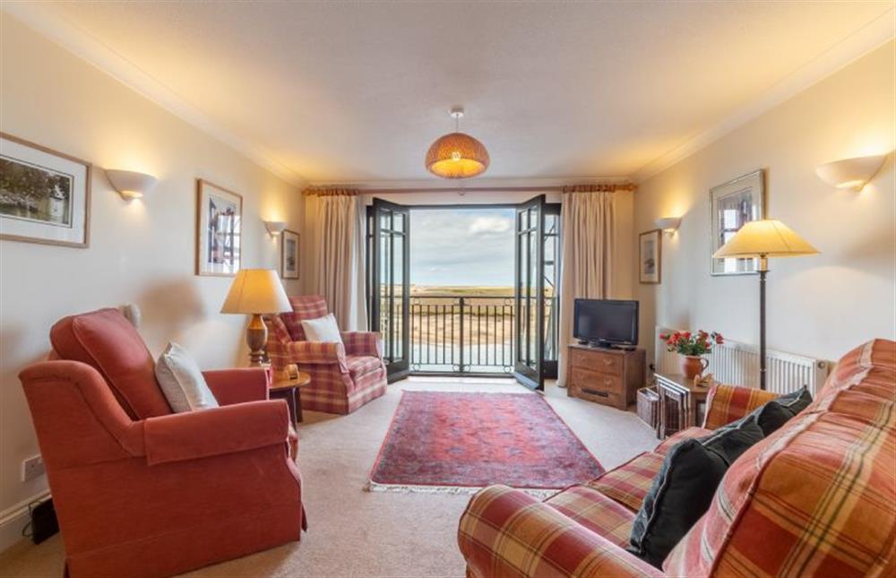 First floor: The Sitting room has stunning views over the marshes at Apartment 2 The Granary, Wells-next-the-Sea