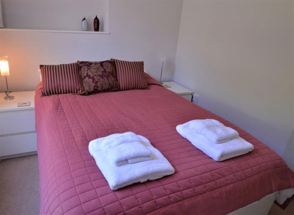 Cosy double bedroom at Apartment 2 The Wheelhouse in Fowey, Cornwall