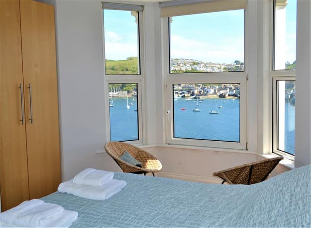 Modest Kingsize bedroom with views of Polruan at Apartment 2 The Wheelhouse in Fowey, Cornwall