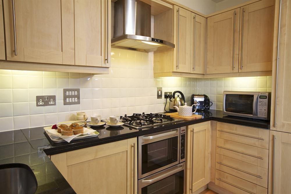 New England 'shaker' style maple kitchen (photo 2) at Apartment 3 Combehaven in Allenhayes Road, Salcombe