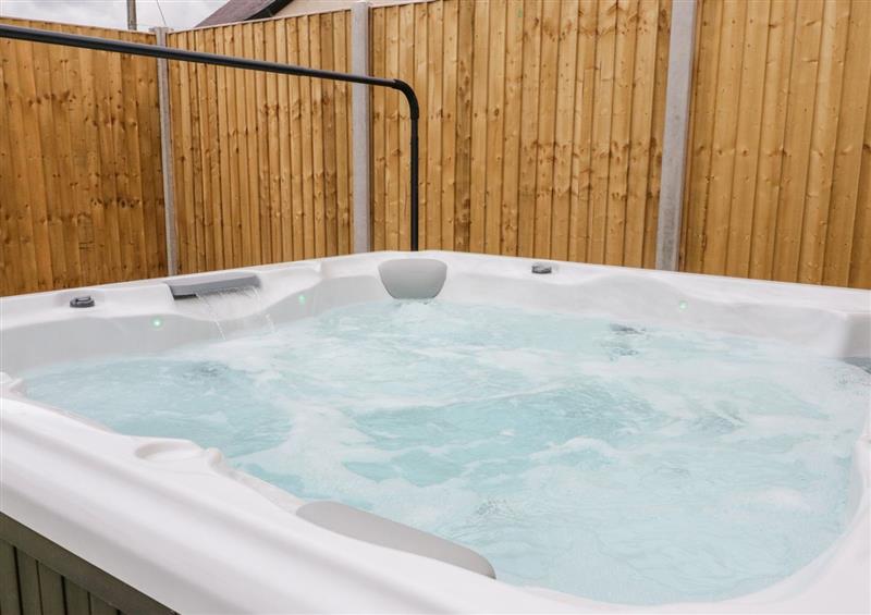 Enjoy the hot tub at Apartment 3, Cynwyd