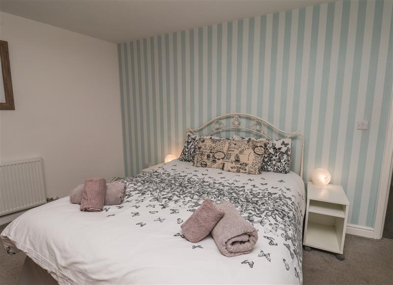 A bedroom in Apartment 4 @52 at Apartment 4 @52, Bridlington