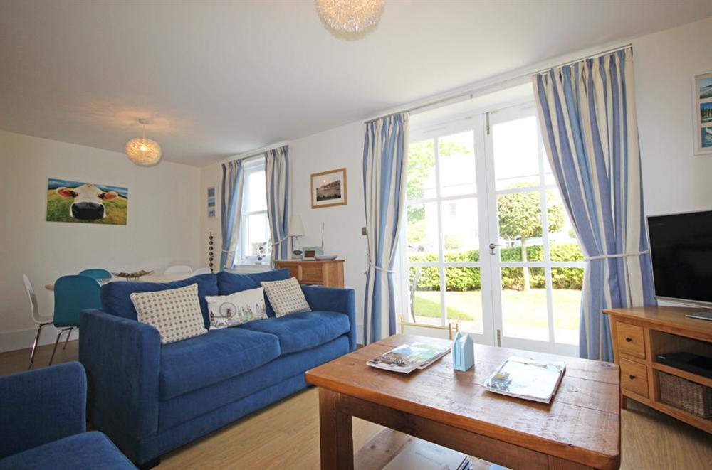 Very comfortable lounge with French doors to terrace (photo 2) at Apartment 5 Combehaven in Allenhayes Road, Salcombe