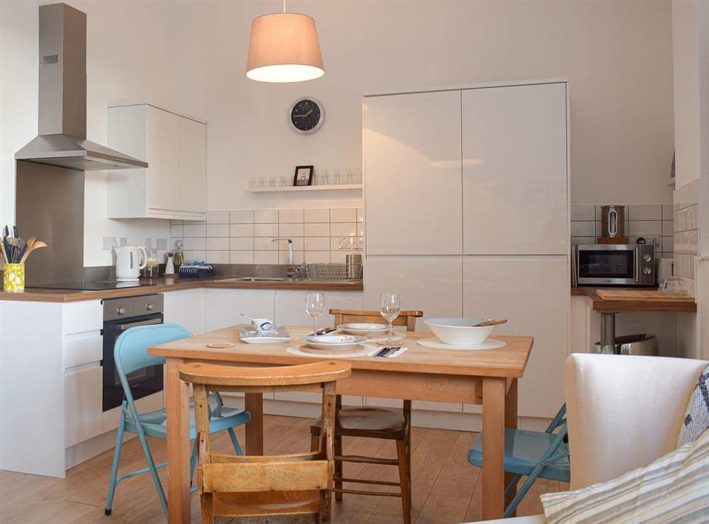 Kitchen and dining area at Apartment 6 (Harlech) in Criccieth, Gwynedd