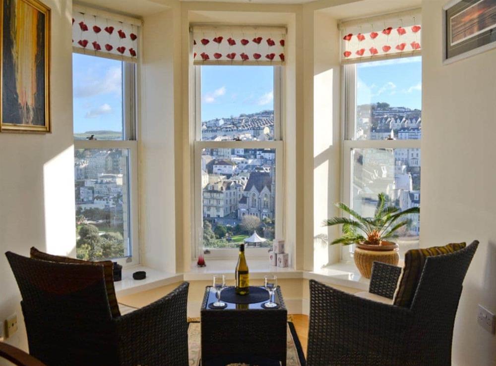 Seating area with fantastic views from the window at Apartment 6 in Ilfracombe, Devon., Great Britain