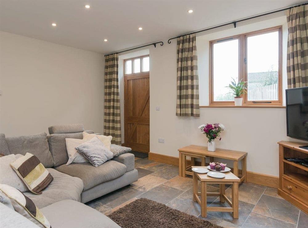 Comfortable living room at Apple Barn in West Pennard, near Glastonbury, Somerset