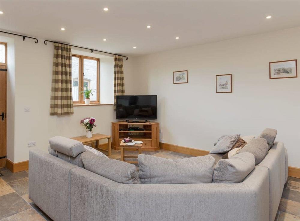 Comfy living room at Apple Barn in West Pennard, near Glastonbury, Somerset