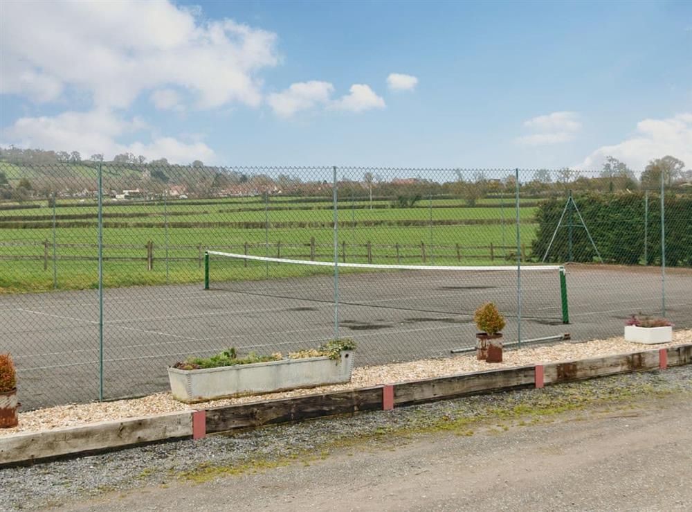 Tennis court at Apple Barn in West Pennard, near Glastonbury, Somerset