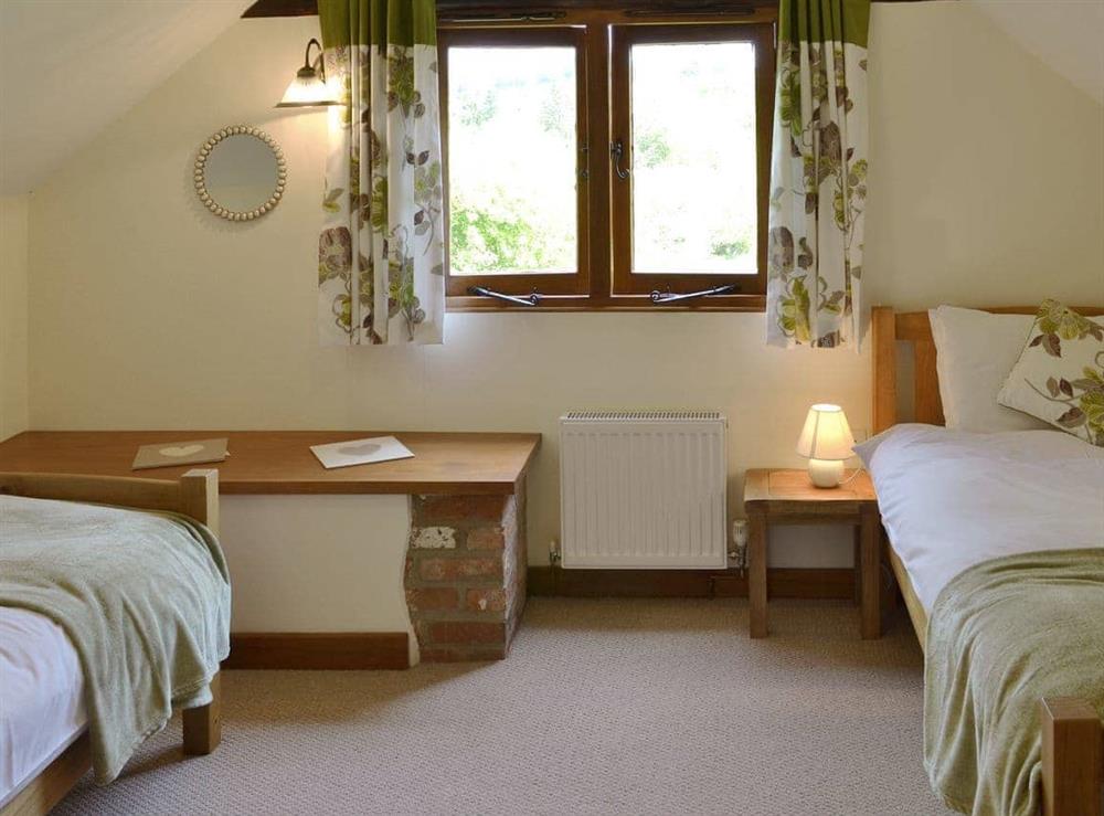 Comfy twin bedroom at Apple Barrel Barn in Dunkeswell Abbey, near Honiton, E. Devon., Great Britain