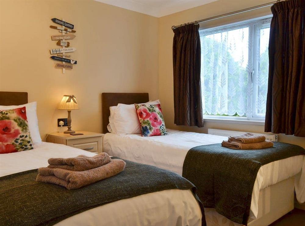 Twin bedroom at Apple Blossom Cottage in St Ervan, near Padstow, Cornwall