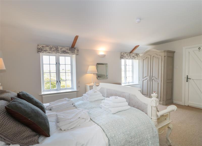 A bedroom in Apple Blossom House at Apple Blossom House, Shipton Gorge
