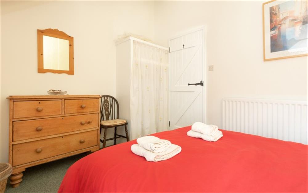 A bedroom in Apple Cottage at Apple Cottage in Slapton