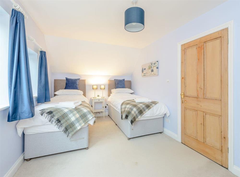 Twin bedroom at Apple Cottage in Spratton, near Northampton, Northamptonshire