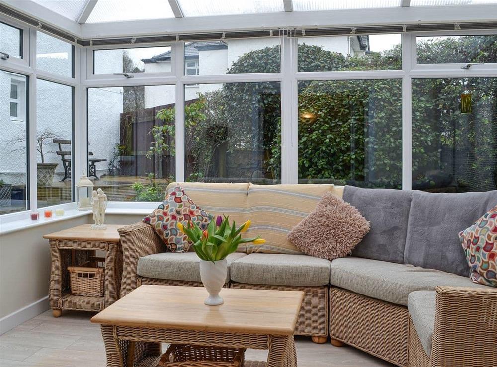 Living area within the conservatory at Apple Cross in Keswick, Cumbria