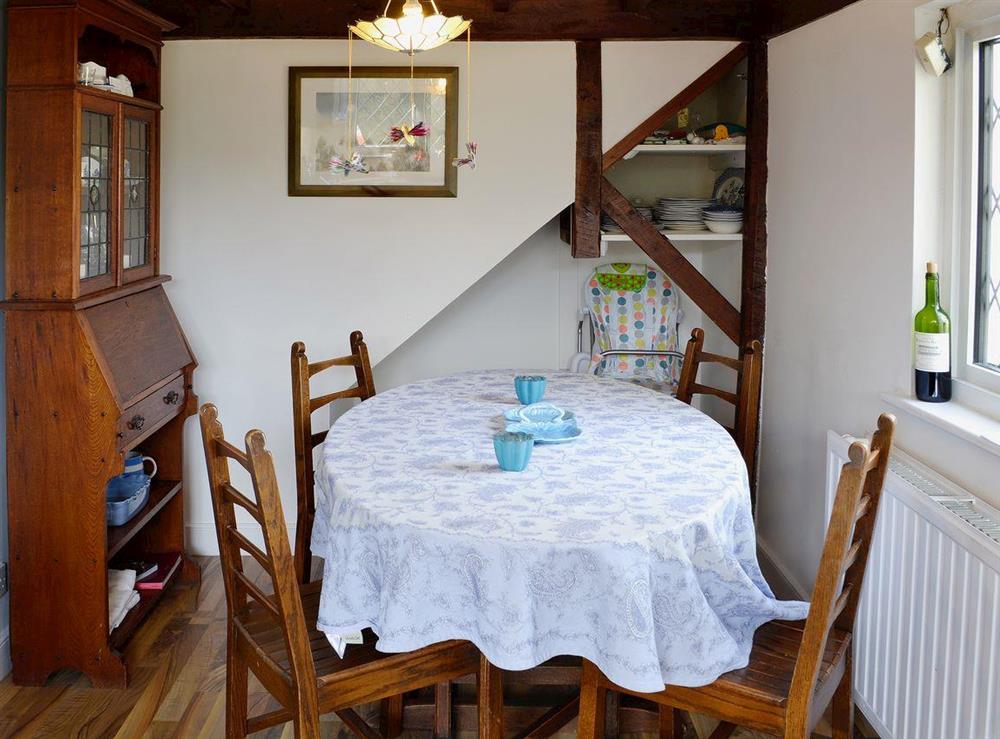 Dining room at Apple Tree Cottage in Charmouth, Dorset