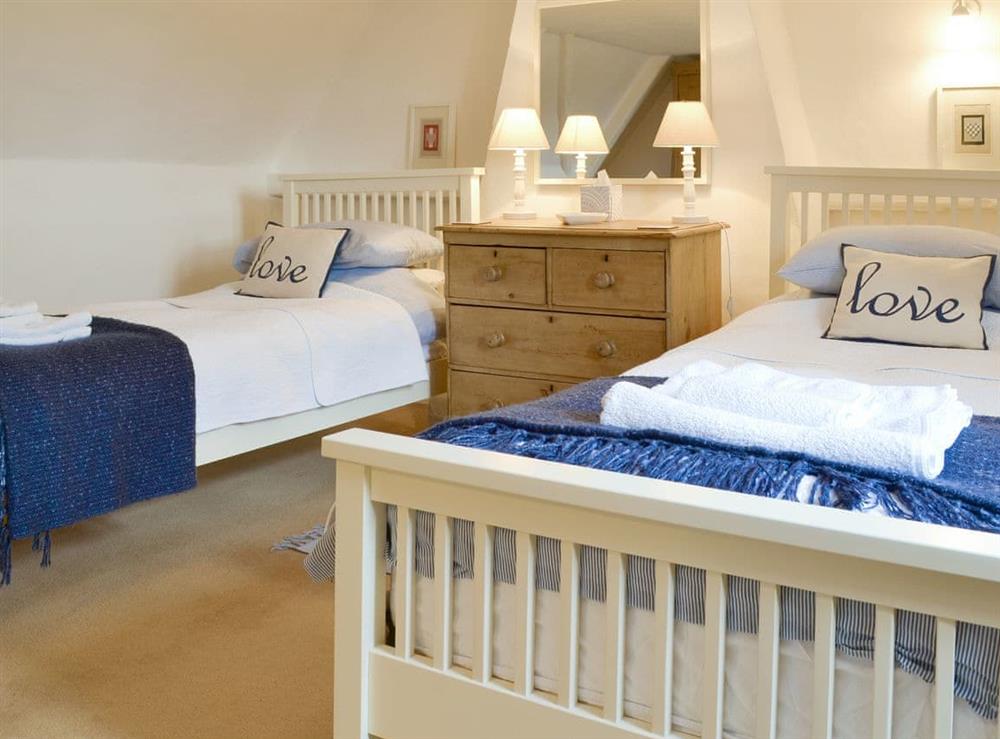 Good-sized twin bedroom at Apple Tree Cottage in Dereham, Norfolk