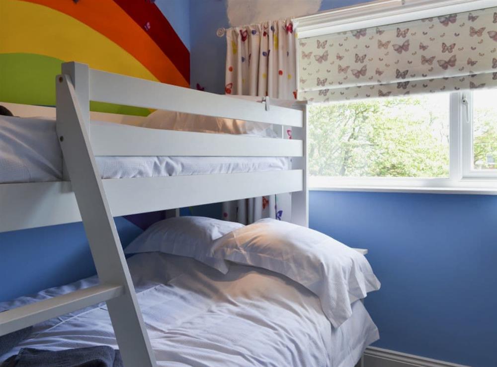 Double bedroom with single bink over at Apple Tree House in Scarborough, North Yorkshire