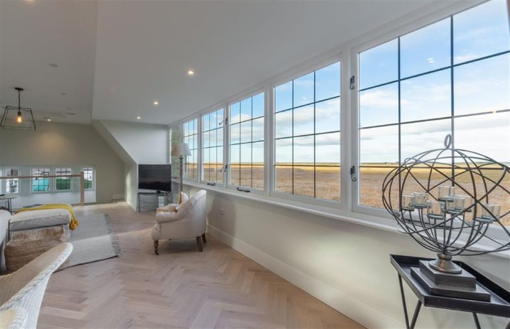 First floor: Full length windows to make the most of the stunning sea view at Appletree Barn, Brancaster near Kings Lynn