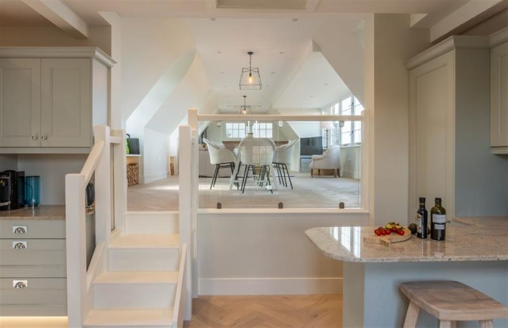 First floor: Steps up from the kitchen to the living area at Appletree Barn, Brancaster near Kings Lynn