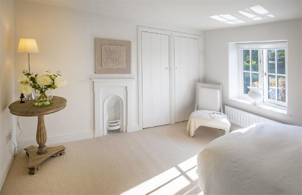 Master bedroom with en-suite and wardrobe at Appletree Cottage, Burnham Market near Kings Lynn