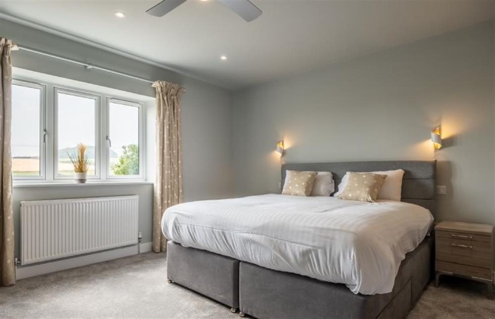 Master bedroom with 6’ super-king at Appletrees, Burnham Market near Kings Lynn