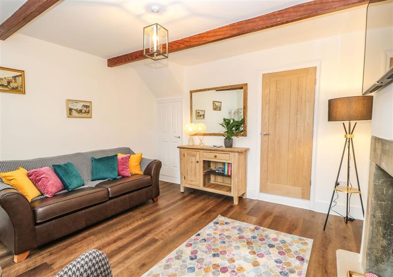 Enjoy the living room at April Cottage, Cross Hills