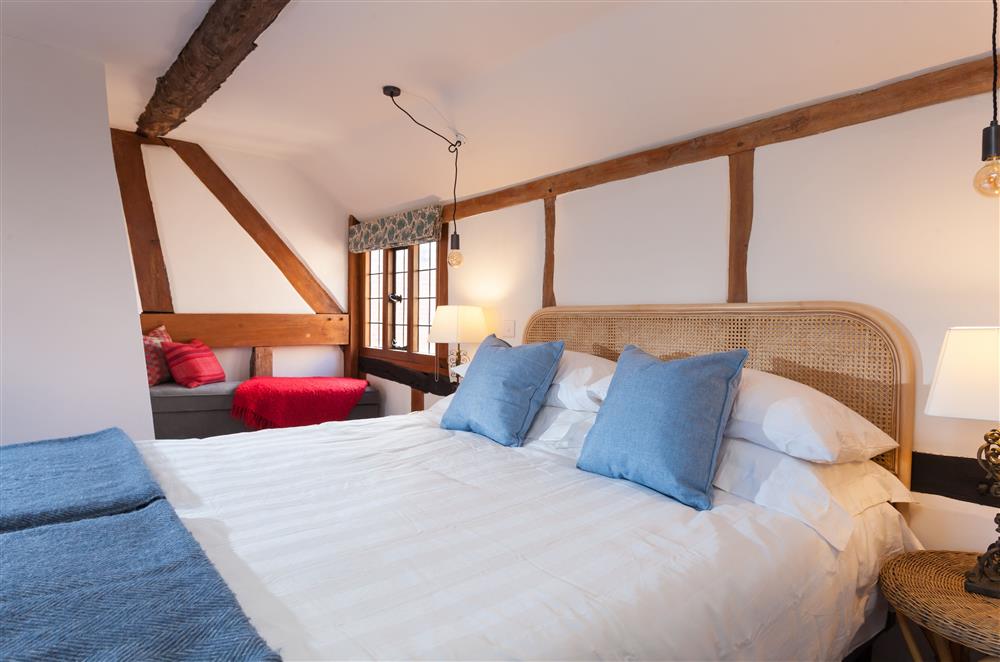 Enjoy the view from the window seat in bedroom one at April Cottage, Eckington