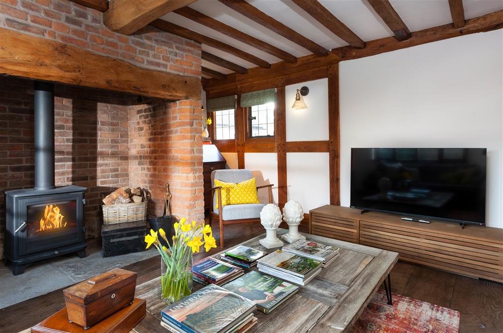 Exposed beams and stone work throughout at April Cottage, Eckington