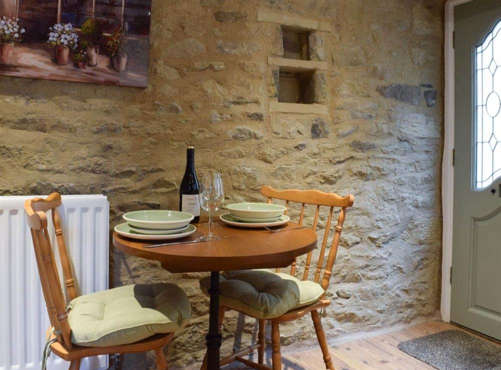 Intimate table for two in the kitchen at April Cottage in Settle, North Yorkshire