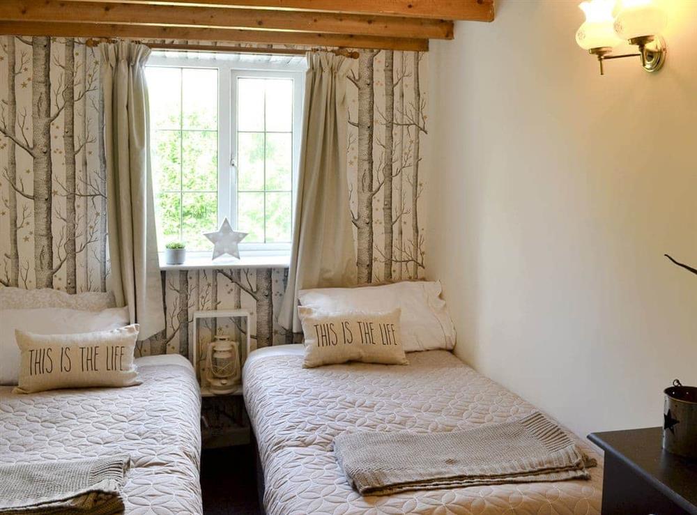Cosy twin bedroom at April Cottage in Staveley-in-Cartmel, near Windermere, Cumbria