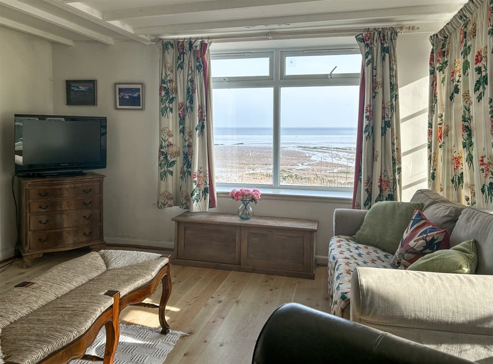 Living area at Shore Cottage, 