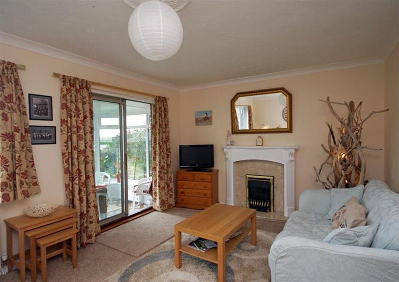 Relax in the living area at Arcadie, Amble