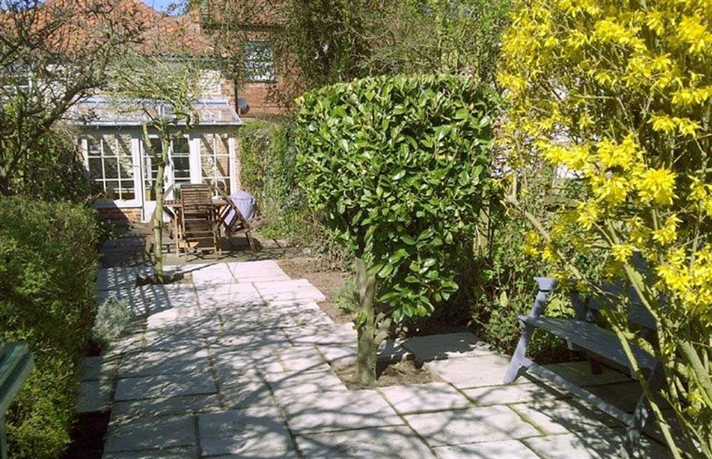 Enclosed courtyard garden at Arch Cottage, Burnham Market  near Kings Lynn