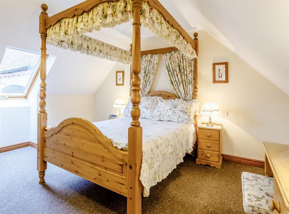 Four Poster bedroom at Archway Barn in Kings Lynn, Norfolk