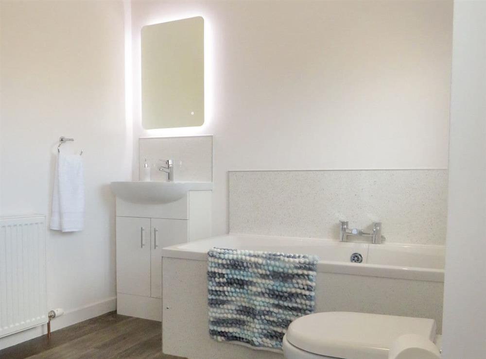 Family bathroom with bath and separate shower cubicle at Ardbeg in Westfield, near Thurso, Highlands, Caithness