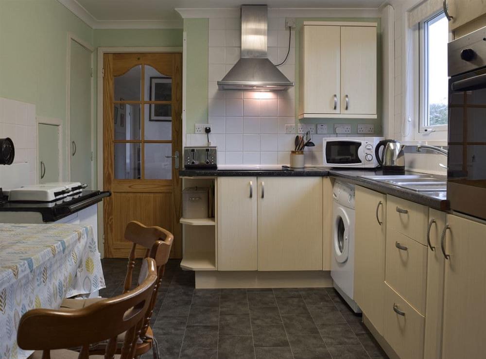 Kitchen with dining area at Arforwest in Near Llangrannog, Cardigan, Dyfed