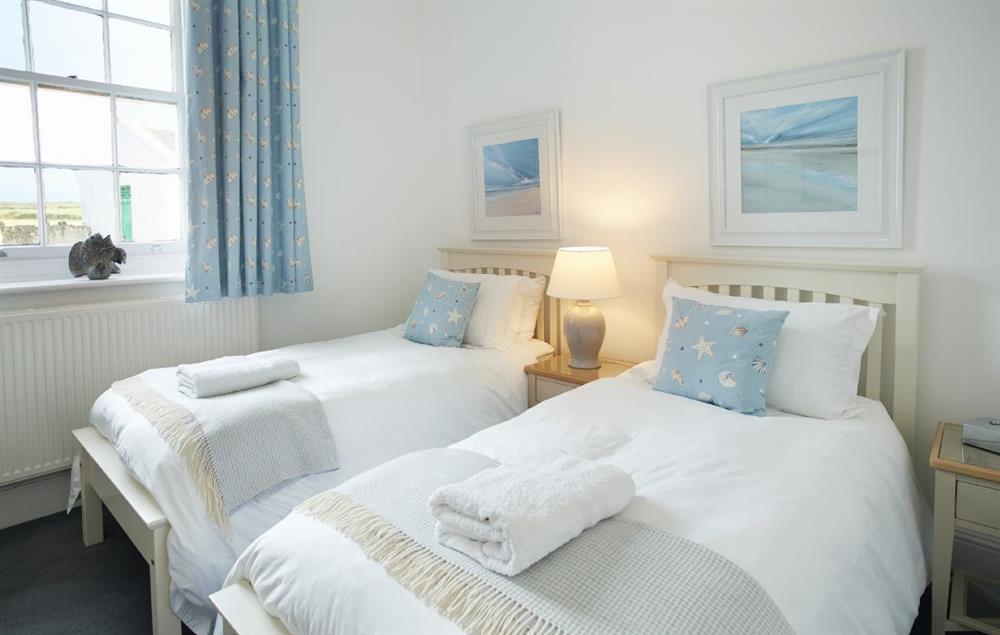 Bedroom with twin 3’ single beds at Ariel, Nash Point Lighthouse
