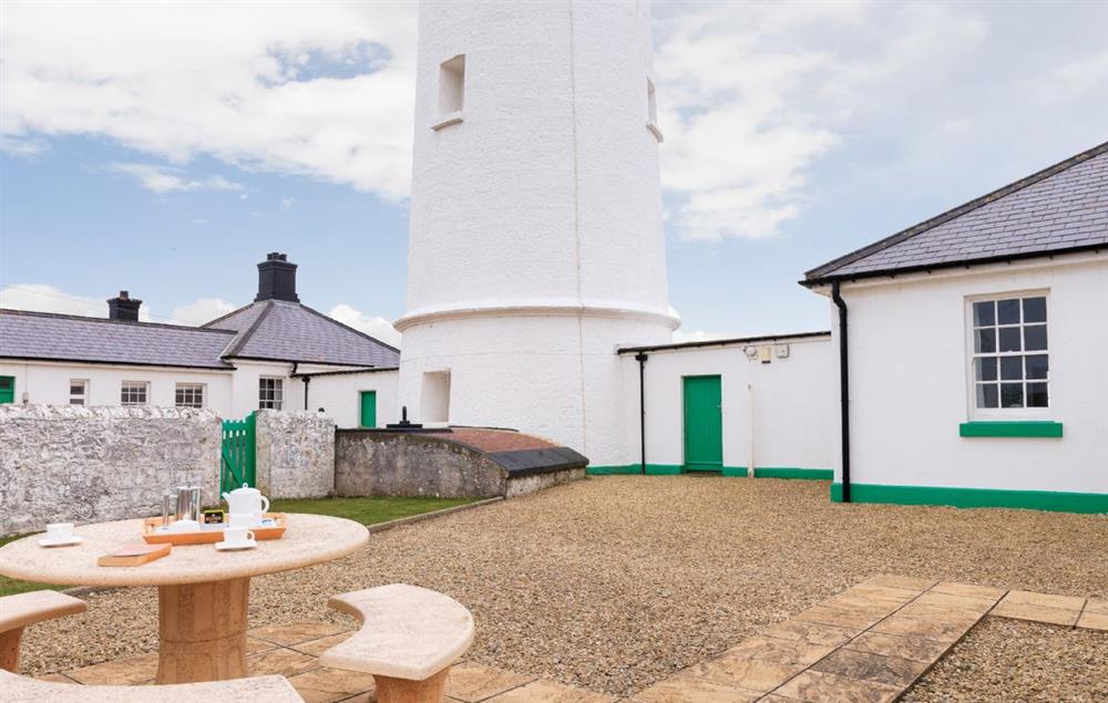 Fully enclosed garden with garden furniture at Ariel, Nash Point Lighthouse