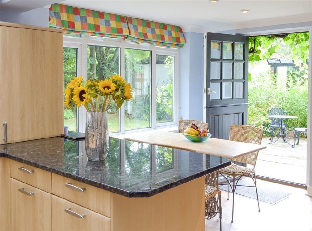 Delightful kitchen and informal dining area at Arnewood Corner in Sway, near Lymington, Hampshire