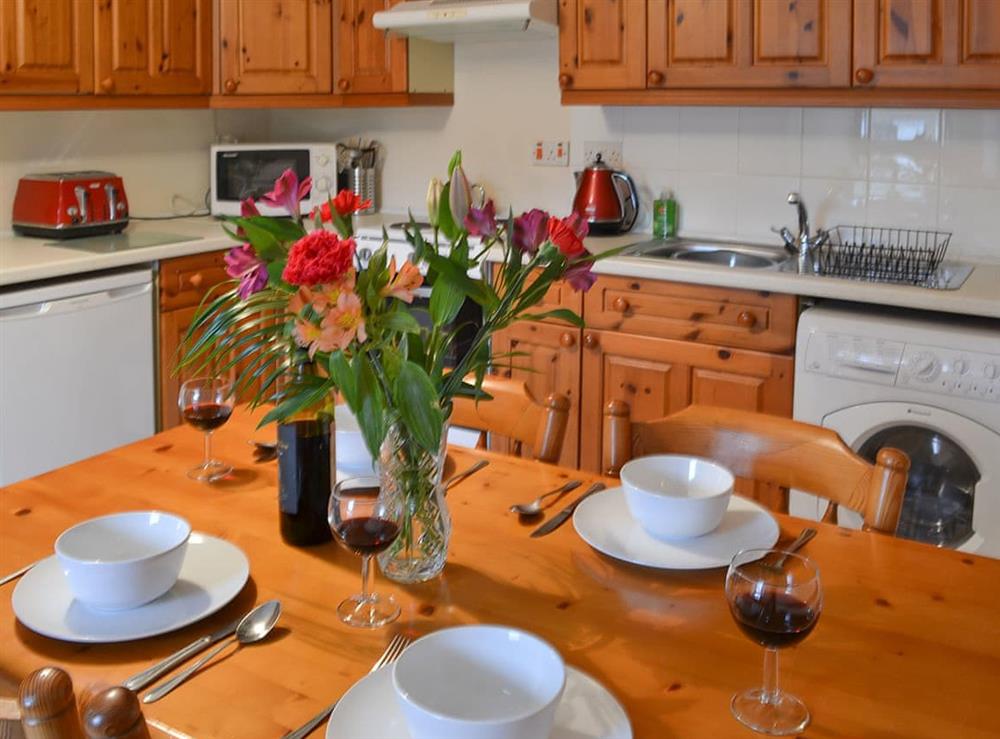 Delightful dining area in the kitchen at Arnish Cottage in Uigshadder near Portree, Isle Of Skye