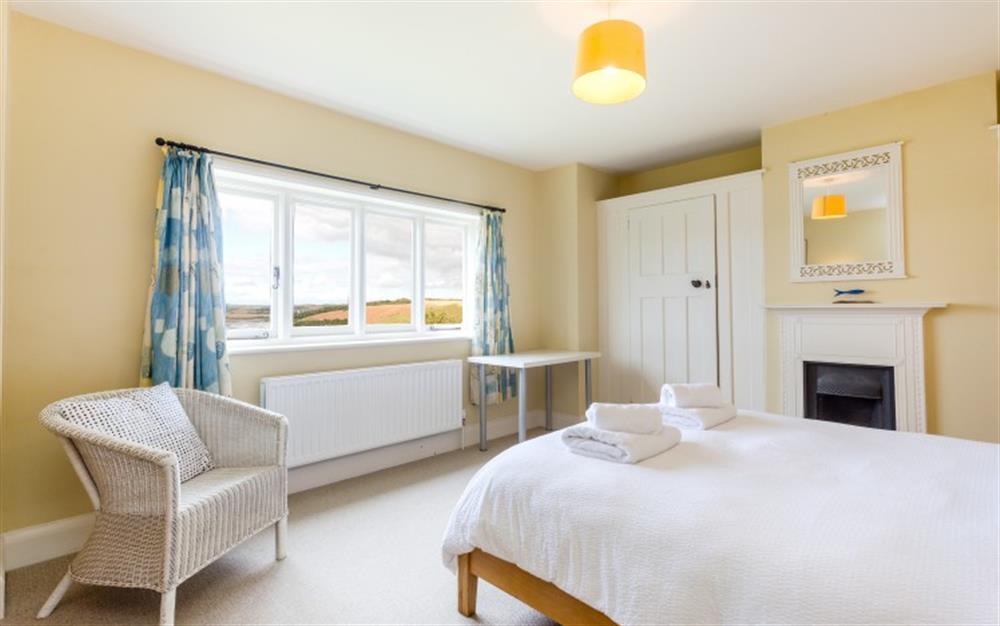The main bedroom with views over the water, Salcombe and up towards Kingsbridge. at Arran in East Portlemouth