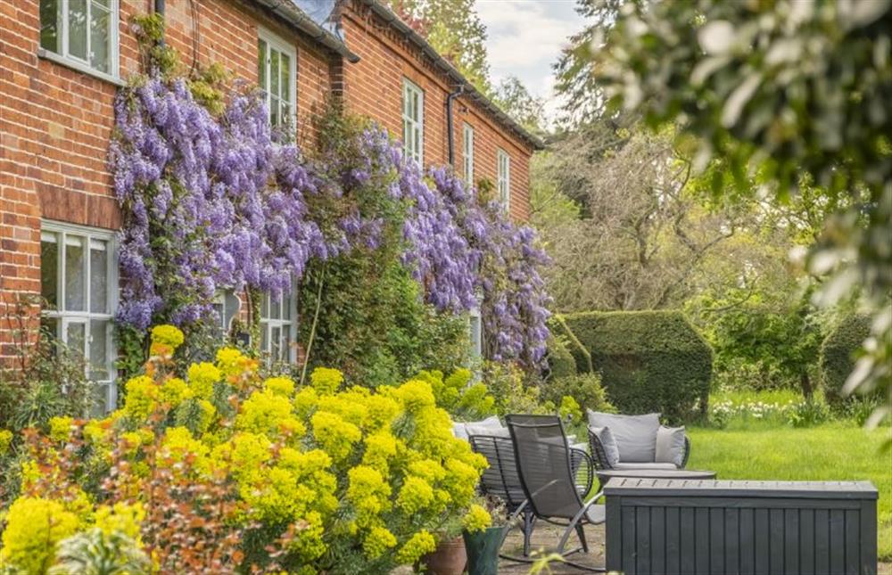 The large house is wrapped by stunning gardens and surrounding private land at Art Farmhouse, Saxmundham